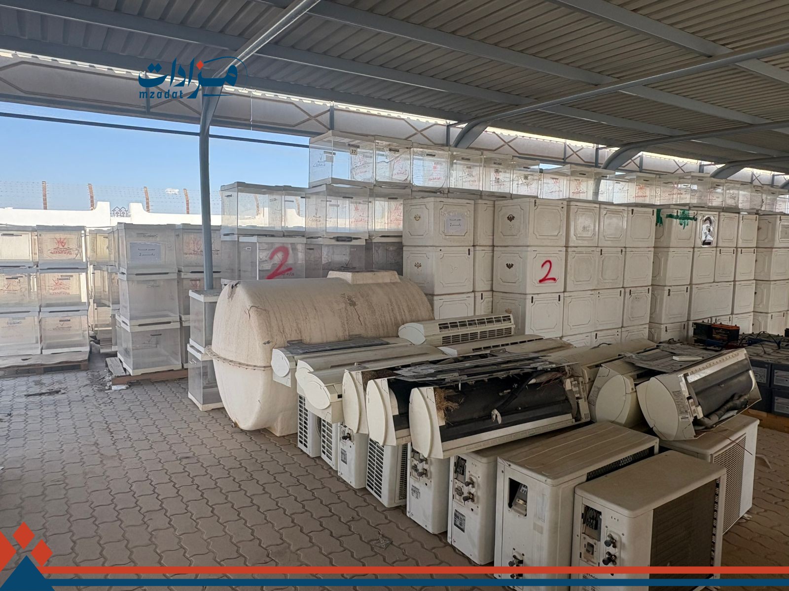 2- Used air conditioners, scrap iron pile, and batteries